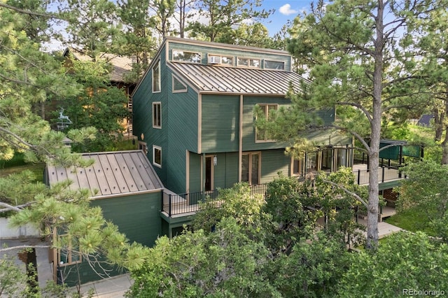 6207 Elbert Pl, Parker, CO 80134 - back of house with a standing seam roof and a metal roof