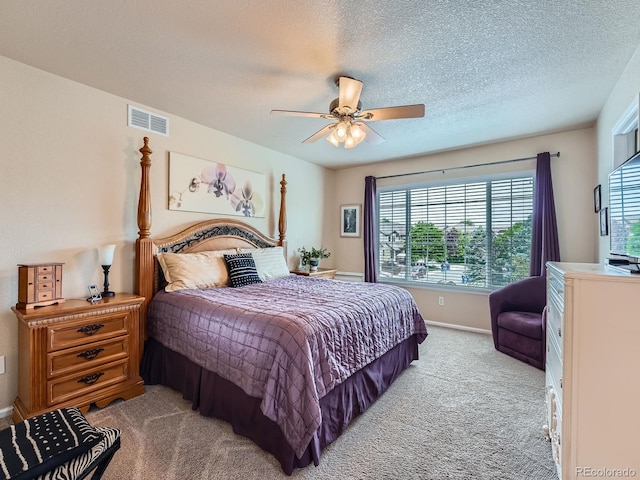 21220 E Nassau Ave, Aurora, CO 80013 - carpeted bedroom with a textured ceiling and ceiling fan