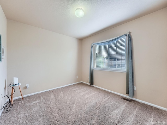 21220 E Nassau Ave, Aurora, CO 80013 - spare room with carpet flooring and baseboards