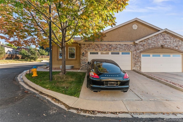 view of front of property featuring a garage