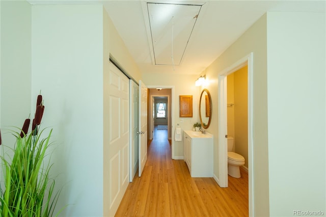 hallway featuring light hardwood / wood-style floors