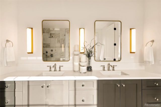 bathroom featuring vanity and an enclosed shower