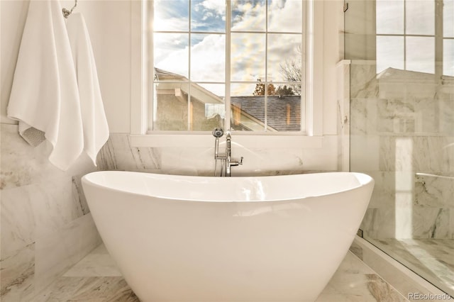 bathroom featuring a washtub