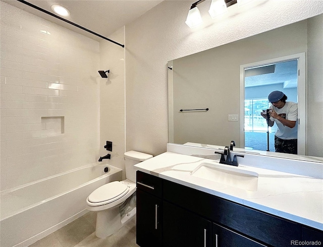 full bathroom featuring vanity, shower / bath combination, and toilet