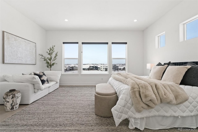 bedroom featuring multiple windows