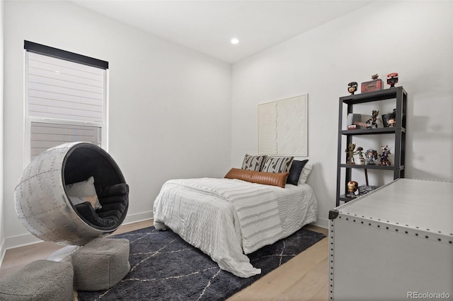 bedroom featuring hardwood / wood-style flooring