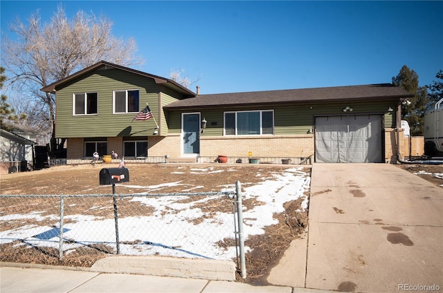 split level home with a garage