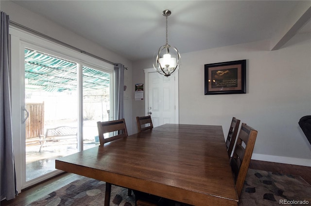 dining area with hardwood / wood-style floors