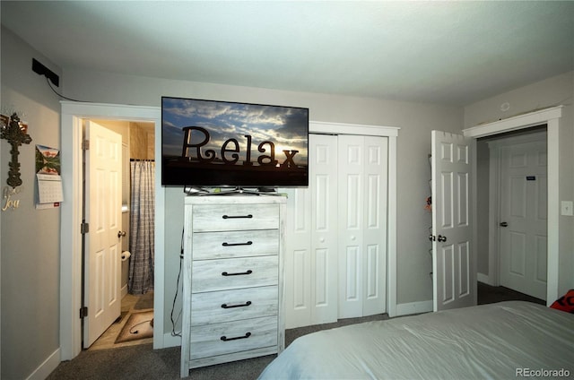 bedroom featuring dark carpet and a closet