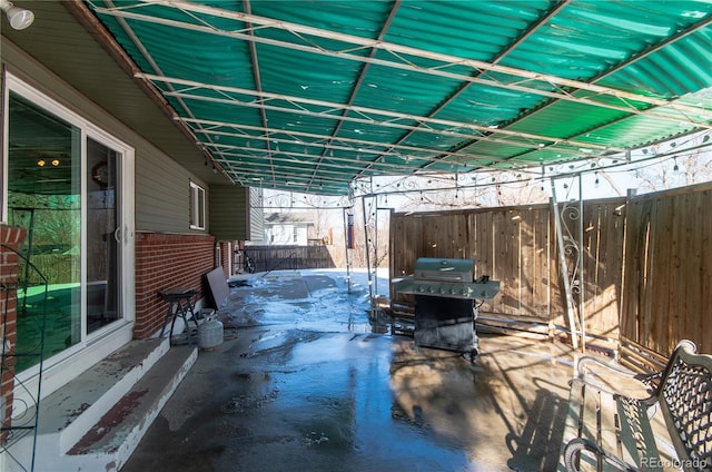 view of patio with a grill