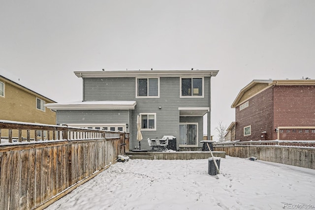 view of snow covered property