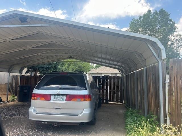 5040 Tennyson St, Denver, CO 80212 - view of parking / parking lot with a carport