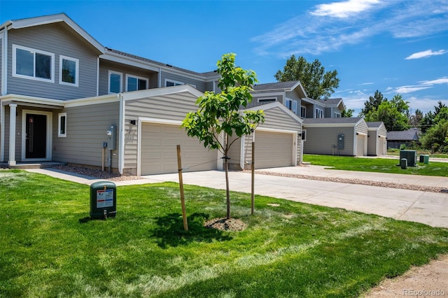 5242 Columbine Ln, Denver, CO 80221 - view of front of home with an attached garage, concrete driveway, and a front yard