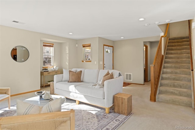 living room featuring light colored carpet