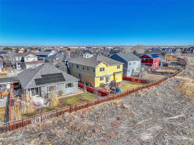 birds eye view of property with a residential view