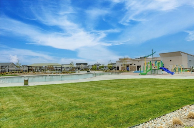 exterior space featuring a residential view and a yard