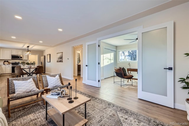 living room featuring light wood-type flooring