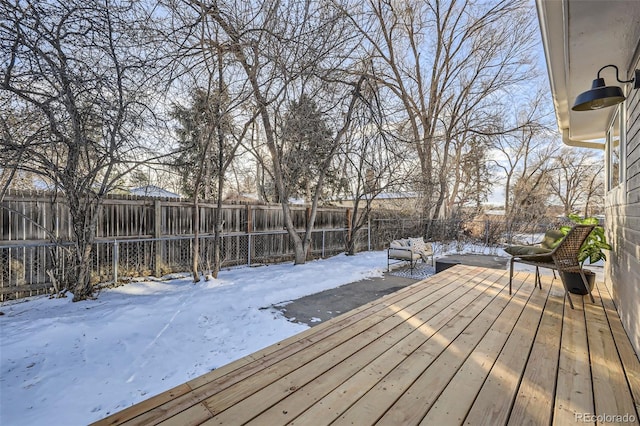 view of snow covered deck