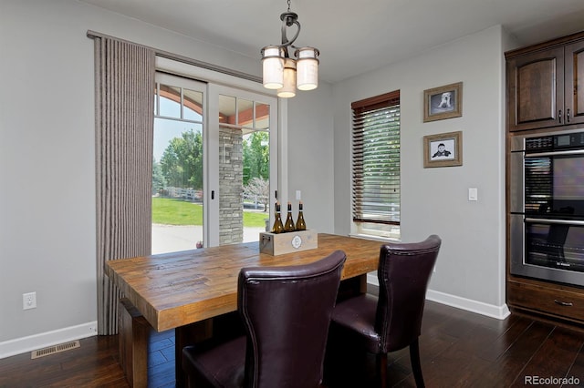 1315 W 141st Cir, Westminster, CO 80023 - dining space featuring dark wood-type flooring
