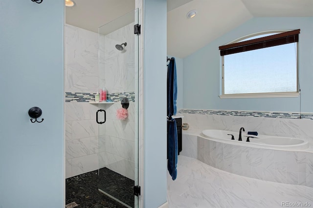 1315 W 141st Cir, Westminster, CO 80023 - bathroom featuring a garden tub, a stall shower, vaulted ceiling, and marble finish floors