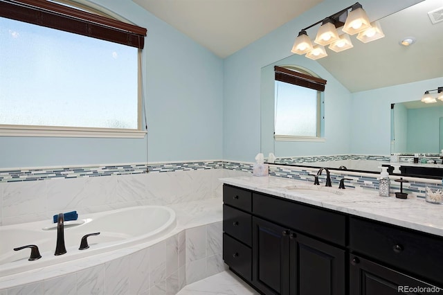 1315 W 141st Cir, Westminster, CO 80023 - bathroom with lofted ceiling, vanity, a bath, and marble finish floors