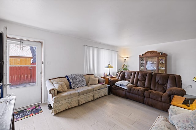 1112 W Mesa Ave Unit 1114, Pueblo, CO 81004 - living area featuring light wood-style floors