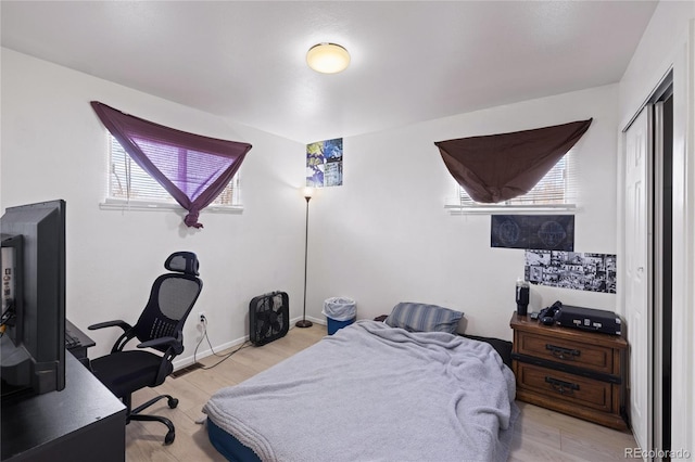 1112 W Mesa Ave Unit 1114, Pueblo, CO 81004 - bedroom featuring light wood-style floors