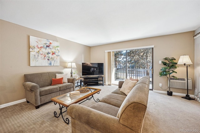 carpeted living room featuring a wall unit AC