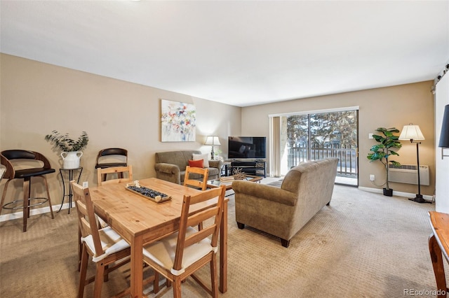 view of carpeted dining space