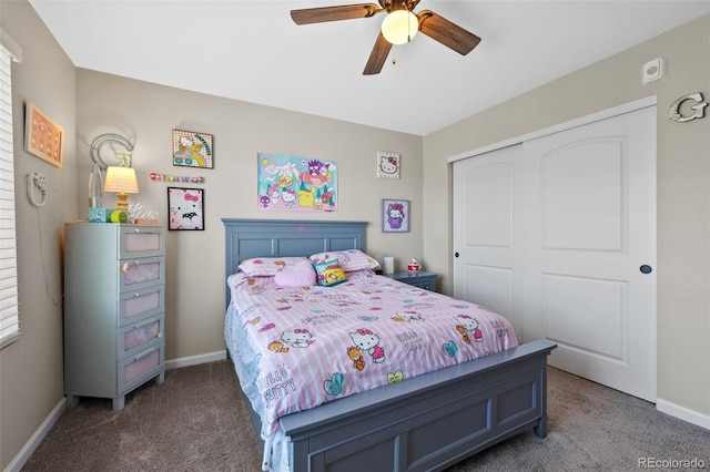 bedroom featuring a closet, carpet flooring, ceiling fan, and baseboards