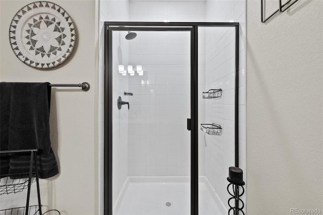 bathroom featuring a stall shower