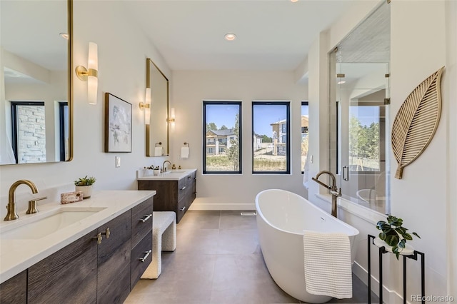 bathroom featuring vanity and a bathtub