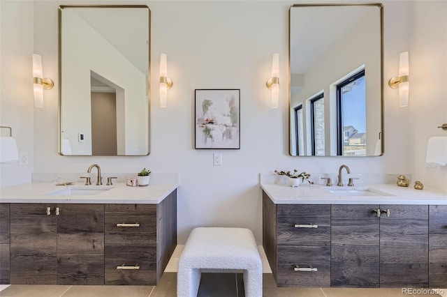 bathroom with vanity and tile patterned flooring