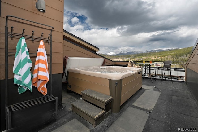 288 Lions Gate Dr, Winter Park, CO 80482 - view of patio / terrace with a mountain view and a hot tub
