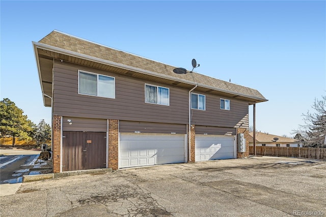 view of home's exterior with a garage