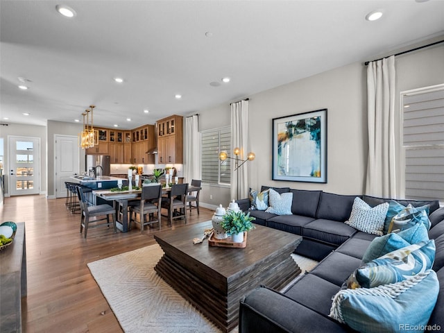1787 W 166th Ave, Broomfield, CO 80023 - living area featuring light wood-style flooring and recessed lighting