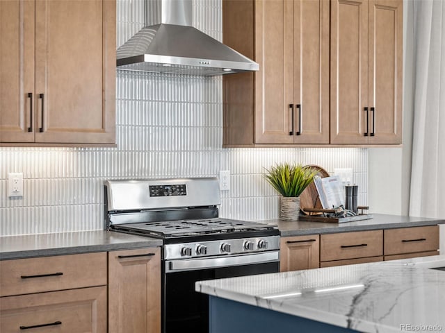 1787 W 166th Ave, Broomfield, CO 80023 - kitchen featuring stainless steel range with gas cooktop, wall chimney exhaust hood, decorative backsplash, and light stone counters