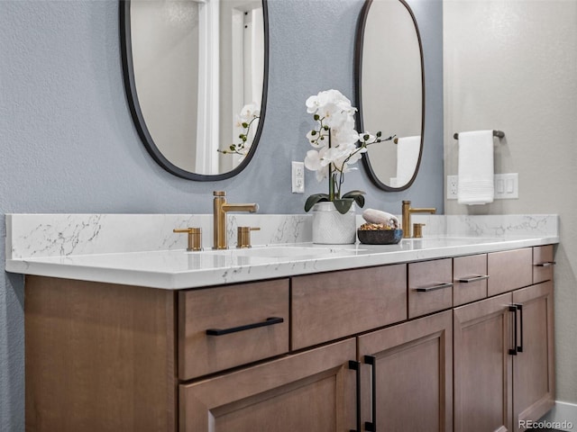 1787 W 166th Ave, Broomfield, CO 80023 - full bathroom with double vanity and a textured wall