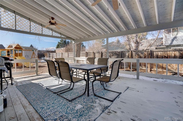 view of patio featuring outdoor dining area, a fenced backyard, and ceiling fan