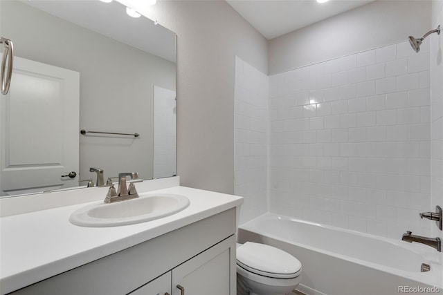 full bath with toilet,  shower combination, and vanity