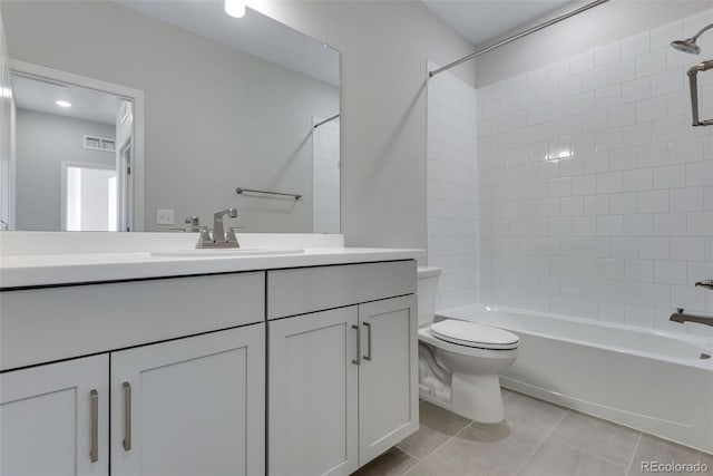 full bath featuring toilet, tile patterned floors, visible vents, vanity, and shower / bathtub combination