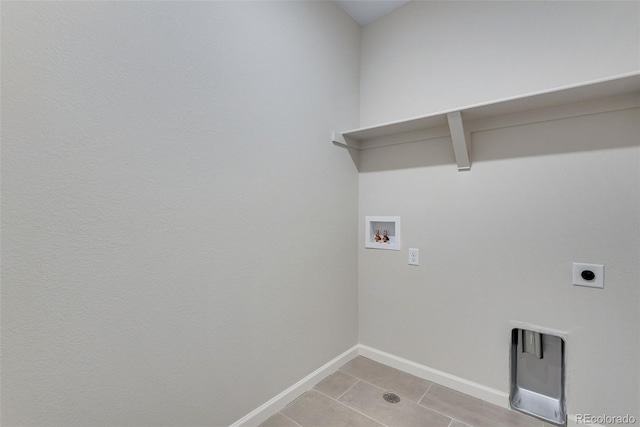washroom with laundry area, light tile patterned floors, electric dryer hookup, baseboards, and hookup for a washing machine