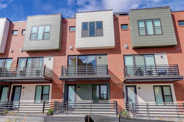 view of property featuring a balcony