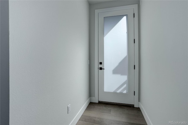 doorway featuring hardwood / wood-style floors