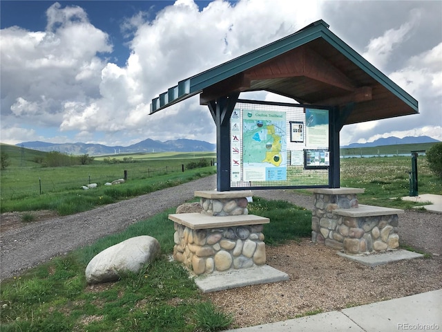 view of community featuring a mountain view and a rural view