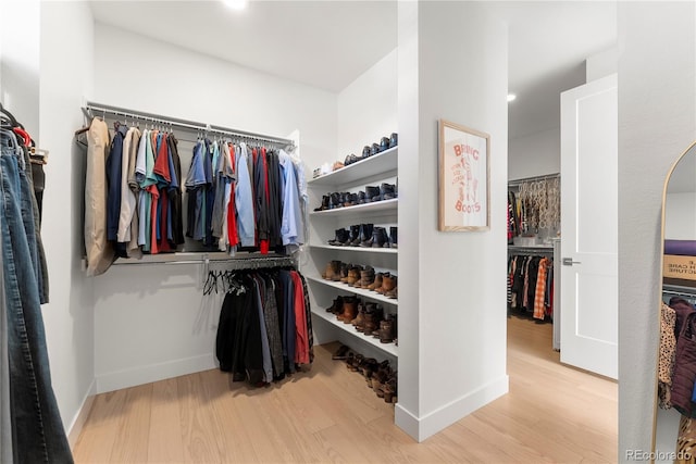 spacious closet with wood finished floors