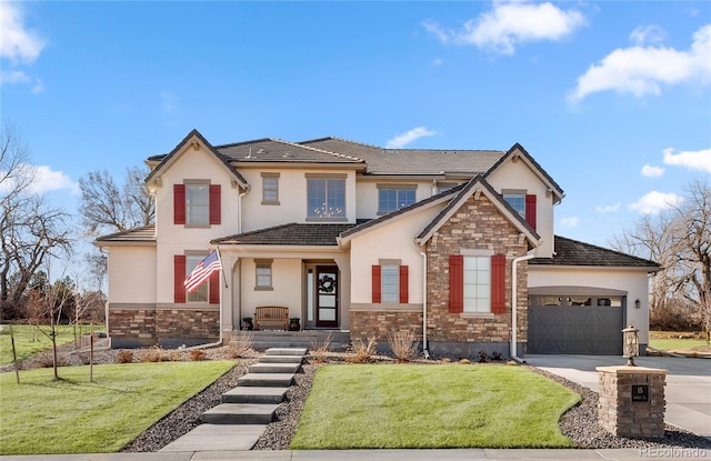 view of front of home featuring driveway, stone siding, an attached garage, and stucco siding