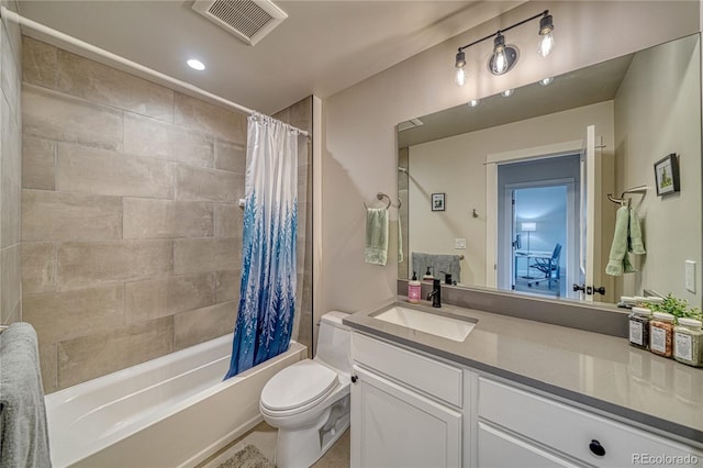 full bathroom featuring shower / bath combo, vanity, and toilet