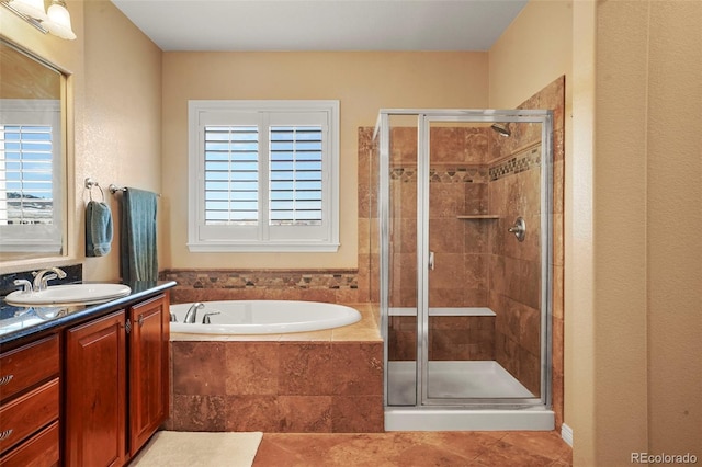 bathroom with vanity, separate shower and tub, and tile patterned floors