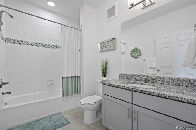 bathroom featuring tile patterned flooring, visible vents, toilet, shower / bath combo, and vanity